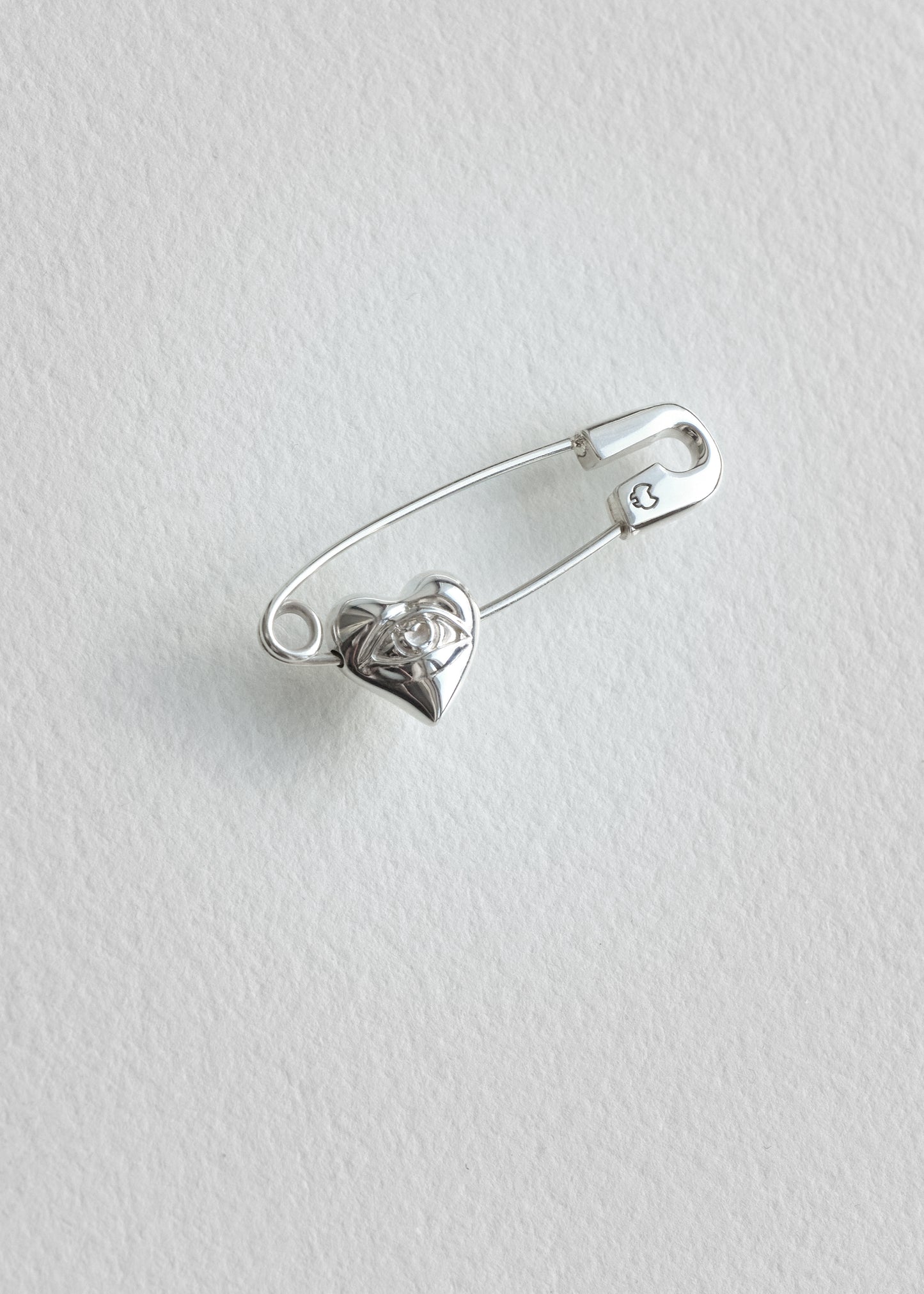 SAFETY PIN Earring with "On ne voit bien qu'avec le cœur" Charm